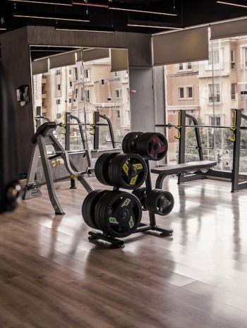 a gym with a view of the city